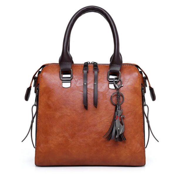 Kit Premium em Couro Genuino - Bolsa + Carteira + Carteira de Mão + Necessaire de Brinde - Imagem 2